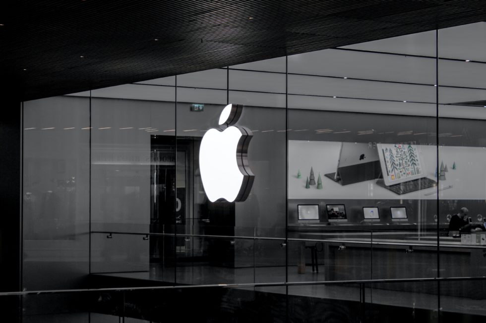 Apple Store interior with brand logo - Illustration of successful branding.